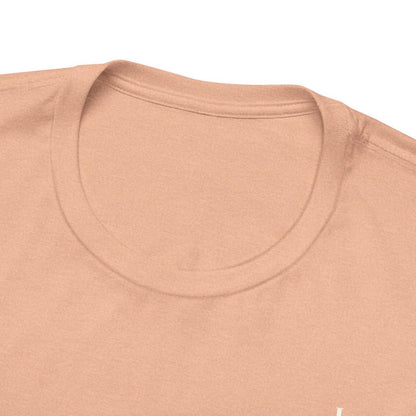 A close-up view of the collar of a light brown t-shirt.