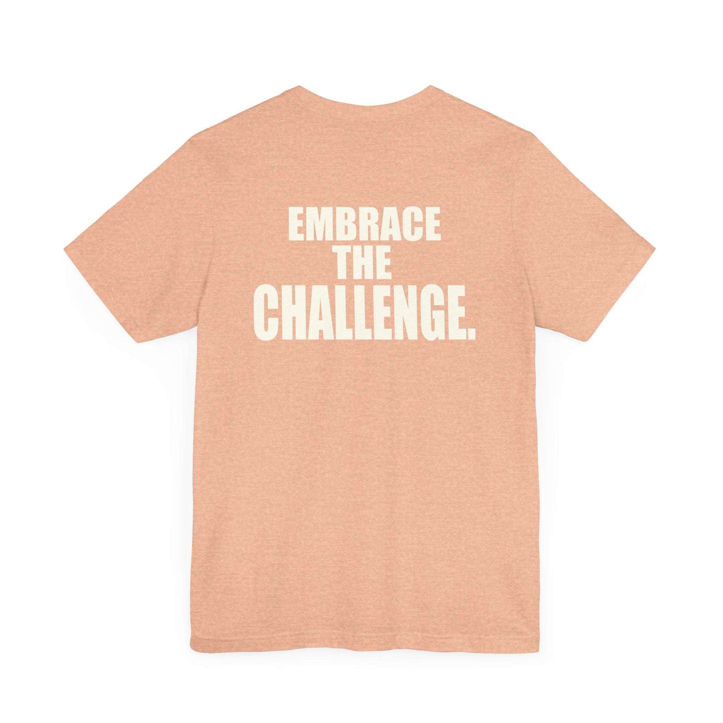 Light brown T-shirt with the text EMBRACE THE CHALLENGE printed in bold white letters on the back. The shirt is displayed against a plain white background.